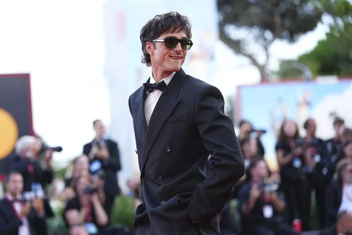 Jacob Elordi poses for photographers at the red carpet for the film 'Frankenstein' during the 82nd edition of the Venice Film Festival in Venice, Italy, on Saturday, Aug. 30, 2025. (Photo by Scott A Garfitt/Invision/AP)