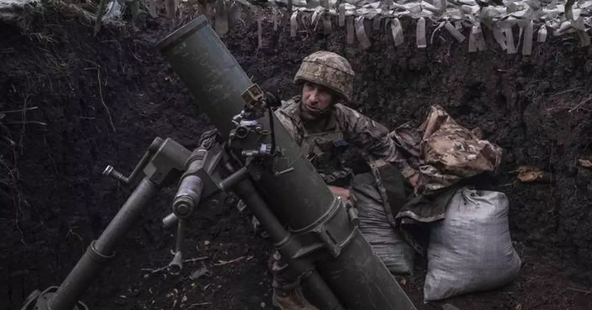 A major Russian drone and missile attack on Kyiv kills at least 21 people