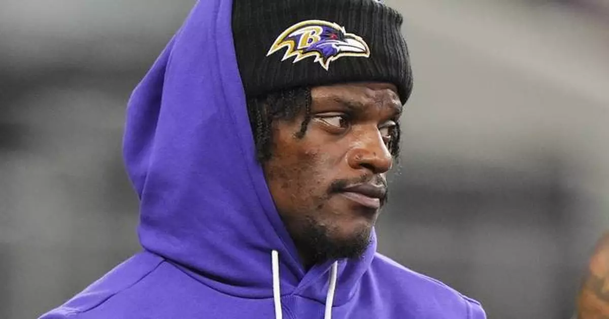 Ravens' Harbaugh says there's 'no damage' to Lamar Jackson's foot after it was stepped on