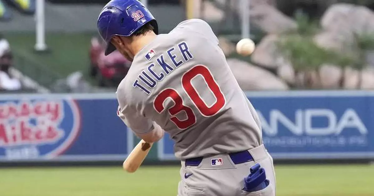 Tucker hits 2 homers and drives in 5 as Cubs blow out Angels 12-1