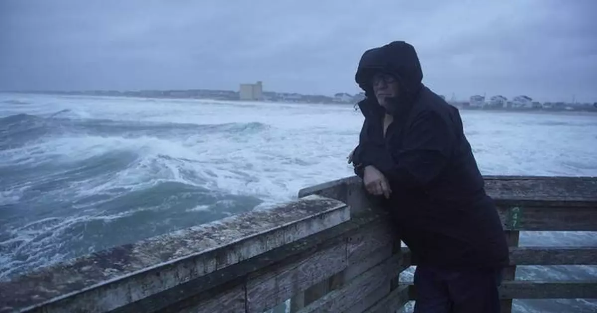 Erin weakens to post-tropical cyclone, moving out to sea as it batters East Coast with wind, waves