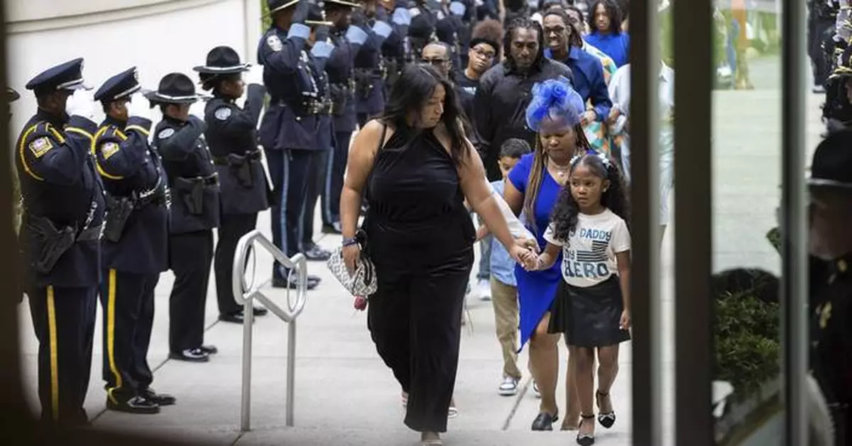 Law enforcement officers remember police officer killed in CDC shooting in Atlanta