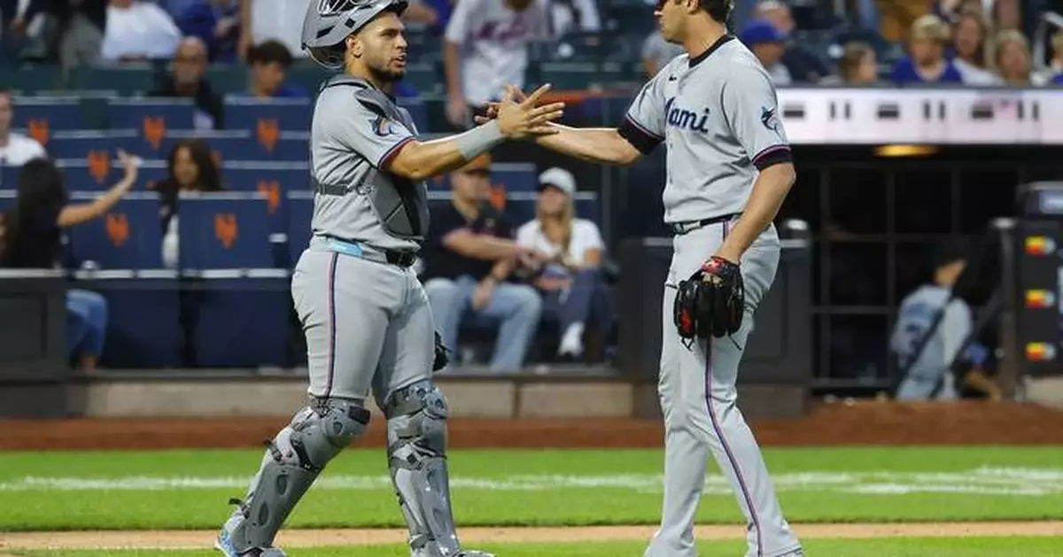 Norby helps Marlins avoid collapse in 11-8 win over Mets