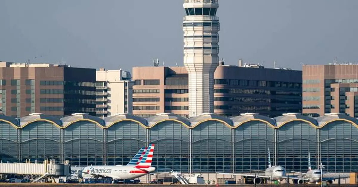 Flights resumed at Reagan airport in DC area after fire alarm in the tower halted all traffic