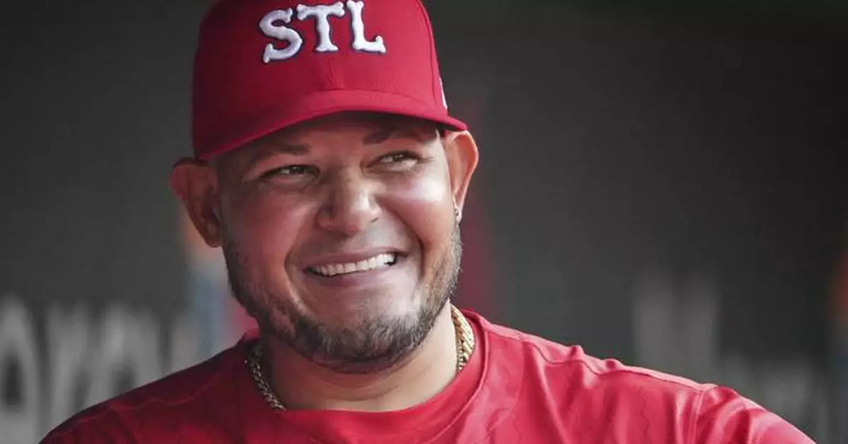Former All-Star catcher Yadier Molina returns to Cardinals' dugout as temporary coach