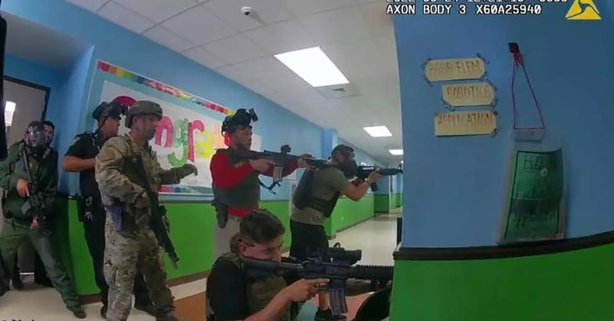 Desperate parents pleaded with officers to act during Uvalde school shooting, video shows