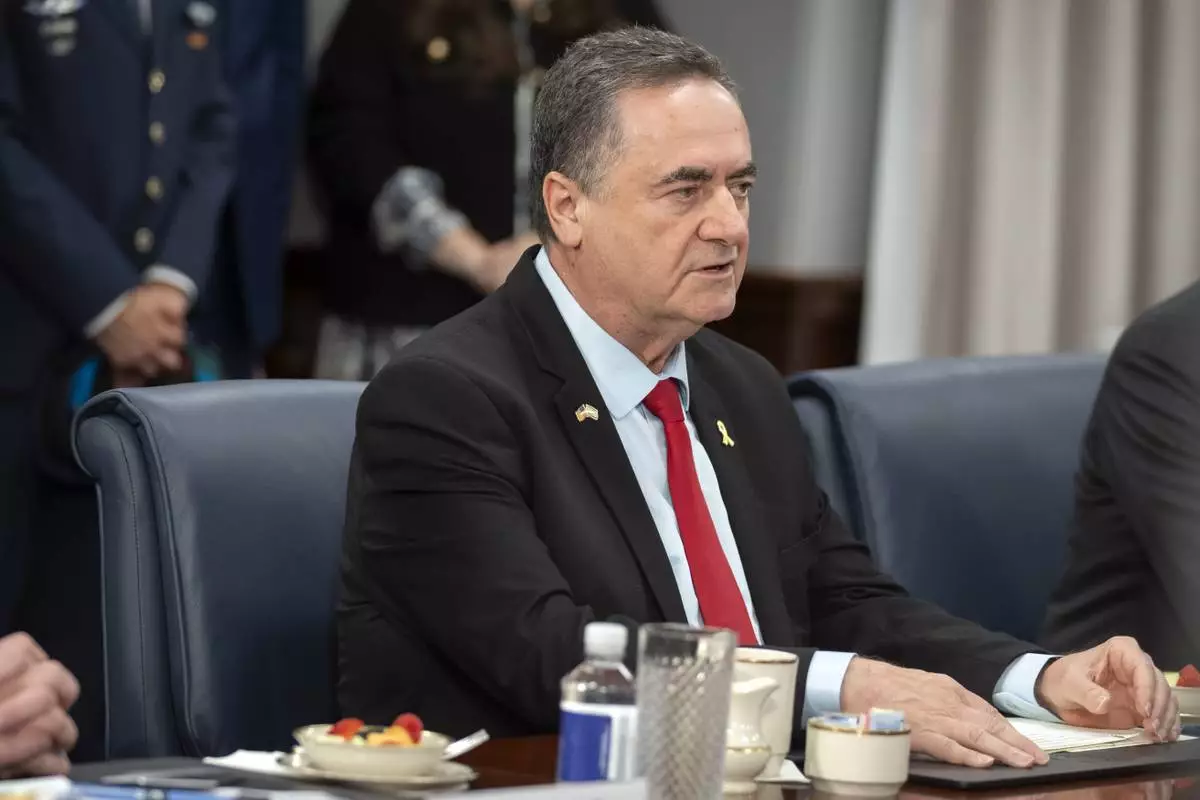 FILE - Israeli Defense Minister Israel Katz speaks during a meeting with Secretary of Defense Pete Hegseth at the Pentagon on July 18, 2025, in Washington. (AP Photo/Mark Schiefelbein, File)