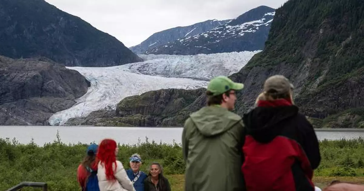New river barriers prevented severe flood damage from a glacial outburst in Alaska, officials say