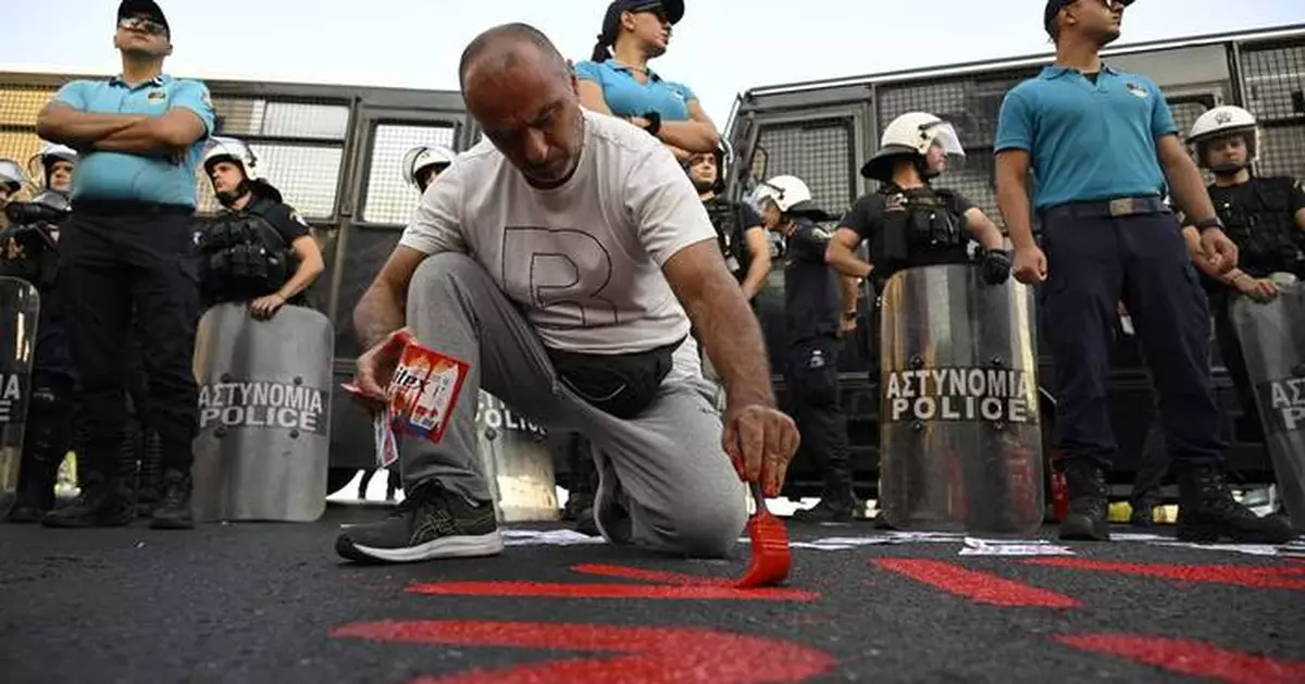 Greek protesters rally against an Israeli cruise ship as EU unions express anger over Gaza