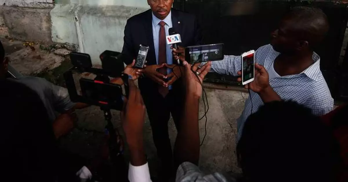 Haitian police arrest a former senator accused of working with gangs to attack a peaceful community