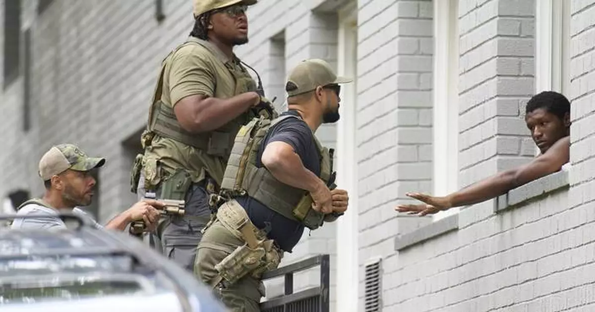 Photos show Trump’s federal crackdown in a DC neighborhood