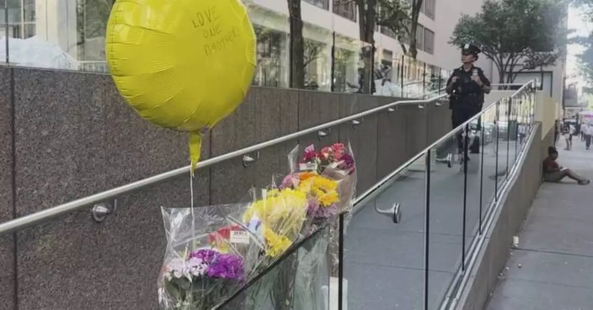 Hundreds honor security guard killed in New York office tower shooting