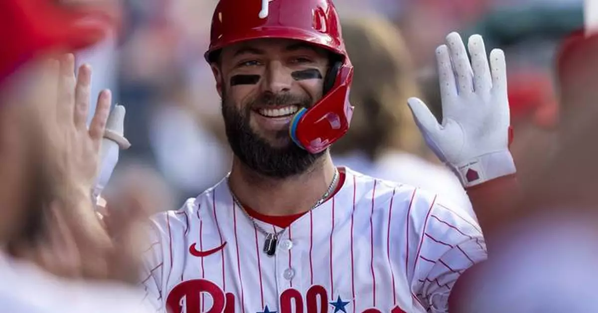 Turner's 2-run single with 2 outs in 10th inning leads Phillies past Braves 3-2