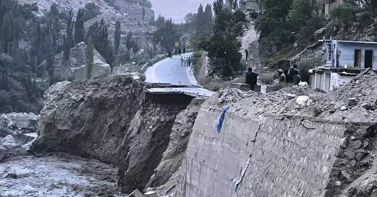 Flash floods triggered by heavy rains kill at least 49 people in northwestern Pakistan