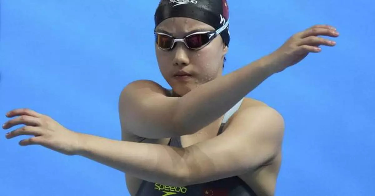 Five different countries take gold medals on a wide-open day at the swim world championships