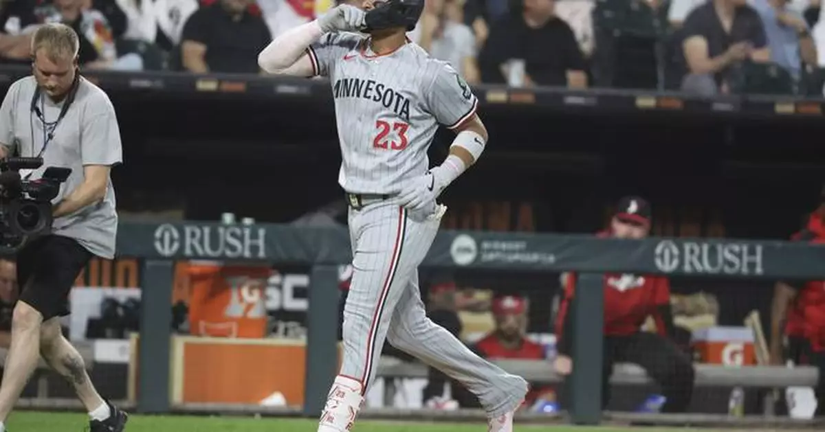Lewis hits grand slam as Twins beat White Sox 9-7 to snap 3-game skid