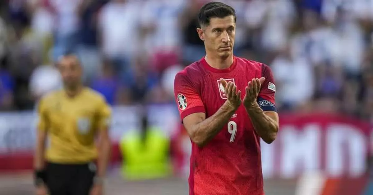 Lewandowski returns to Poland's national team as captain following row with former coach