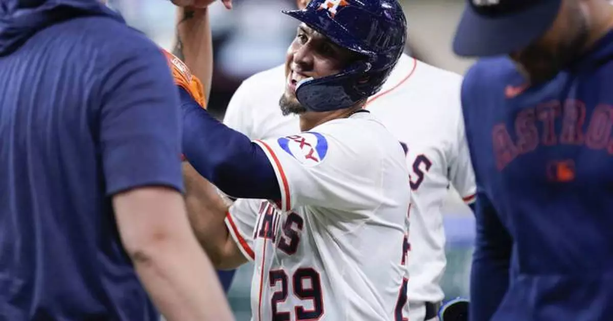 Urìas beats throw to 1st to help the Astros outlast the Orioles, 5-4 in 12 innings