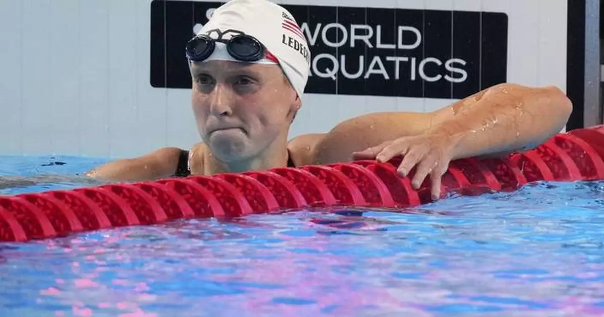 Americans set a relay world record in swim worlds in Singapore and Ledecky wins again