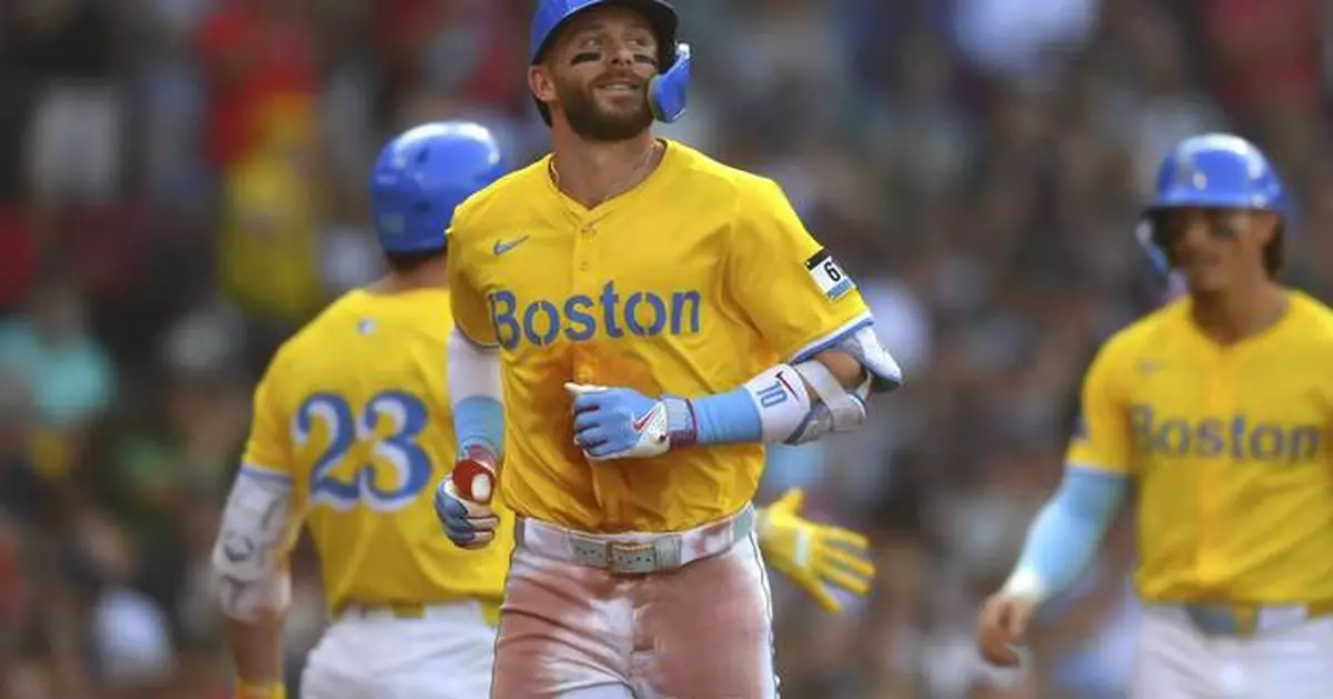 Trevor Story hits a 3-run homer as the Red Sox hold off the Marlins for a 7-5 win