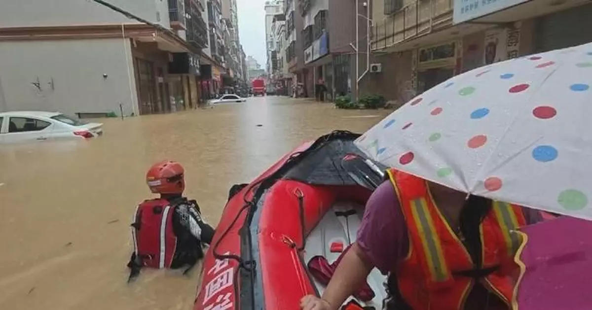 Firefighters brave floodwaters to rescue trapped residents in south China's Guangdong