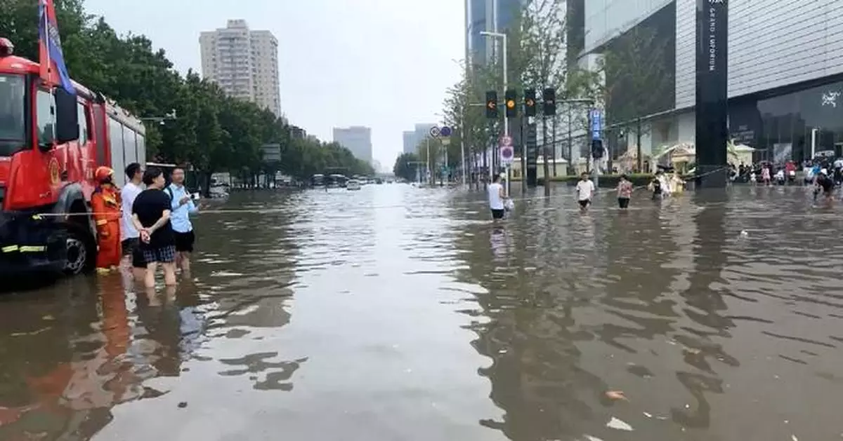 Heavy rain hits Henan, flood response upgraded