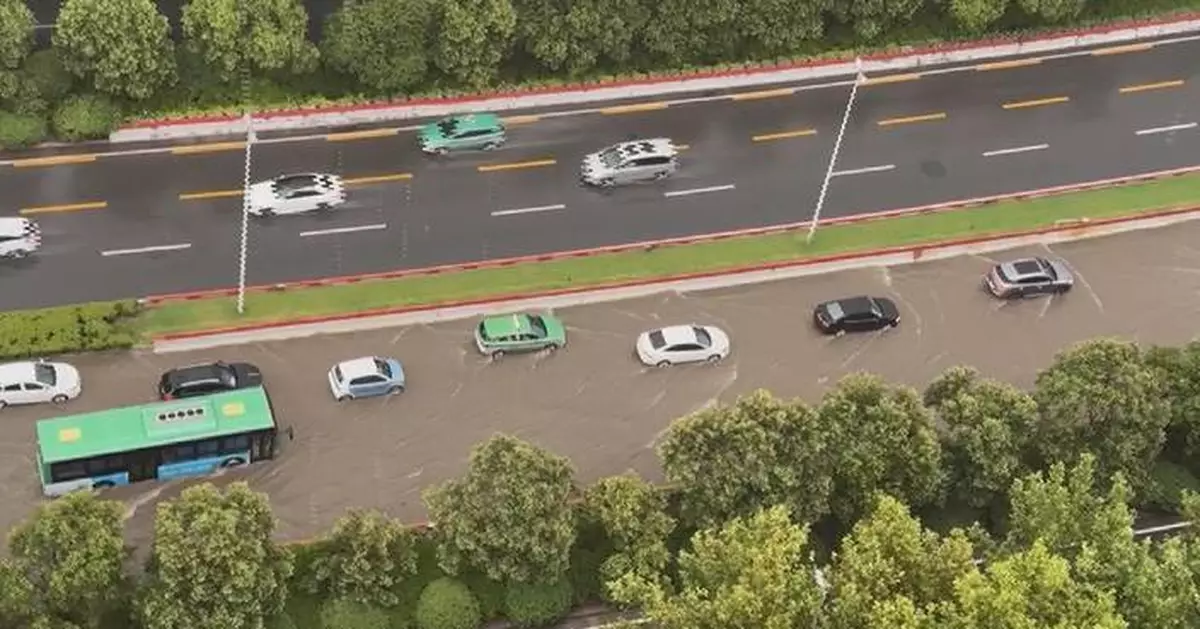 Heavy rainfall triggers flooding in central China as northern regions brace for downpour