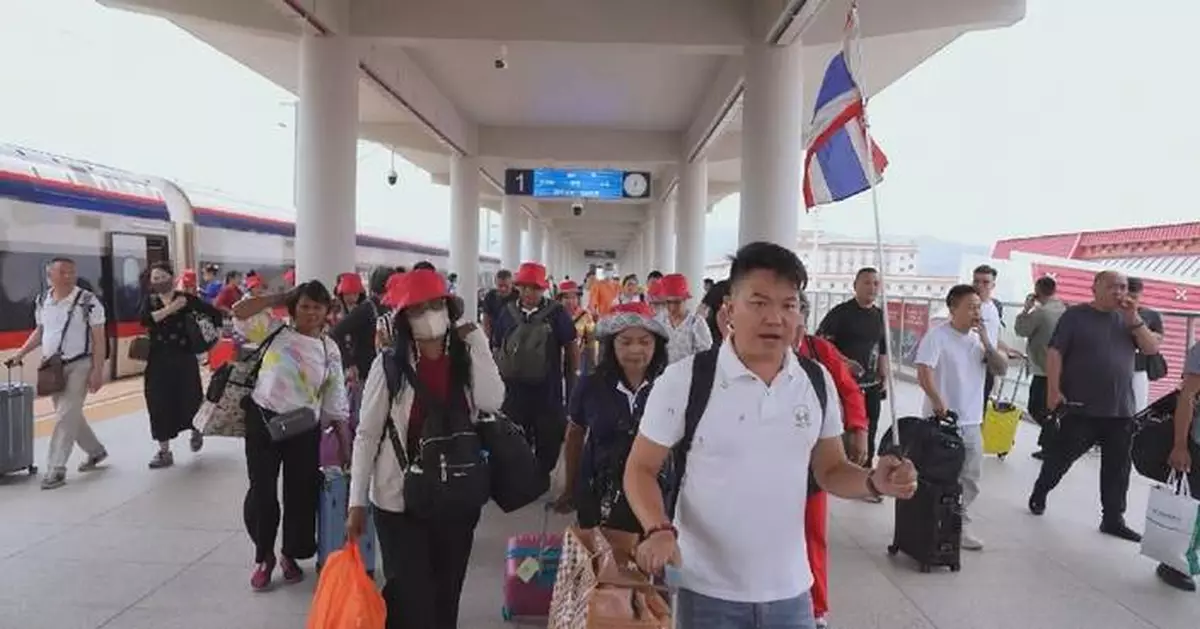 Cross-border travel booms along China-Laos railway during summer rush