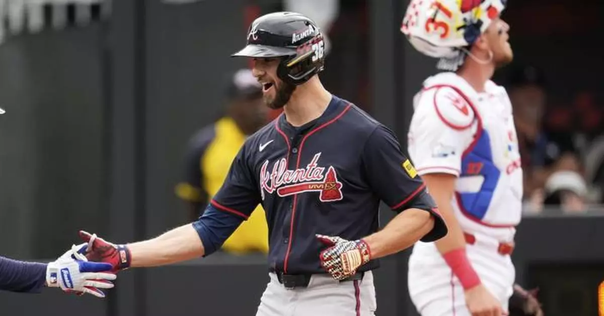 White goes deep twice as the Braves beat the Reds in rain-delayed MLB Speedway Classic at Bristol
