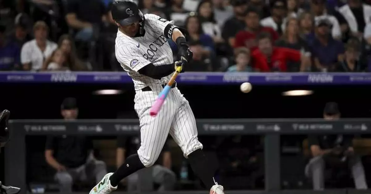 Farmer, Freeman power Rockies' 6-run 8th in a 10-7 victory over the Diamondbacks