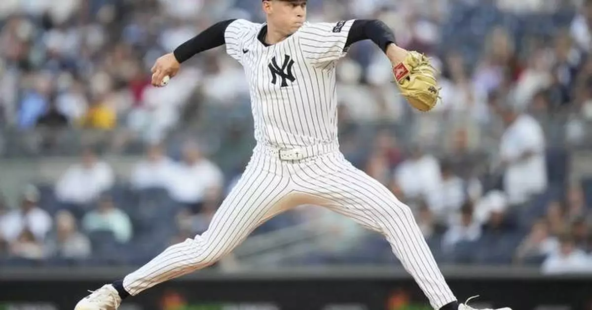 Warren pitches 6 2/3 innings to lead the Yankees to 6-2 win over the Twins