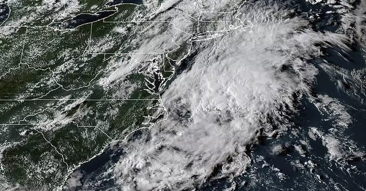 Hurricane Erin leaves rough seas with 2 swimmers dead and a search underway for a missing boater