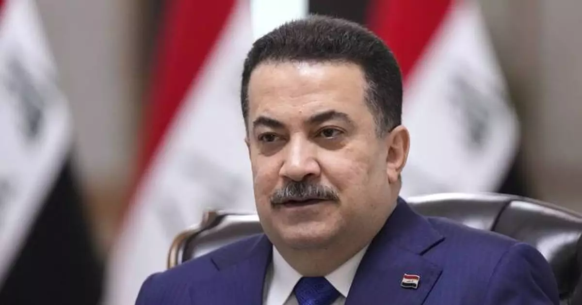 Iraqi prime minister removes paramilitary commanders after deadly clash with police