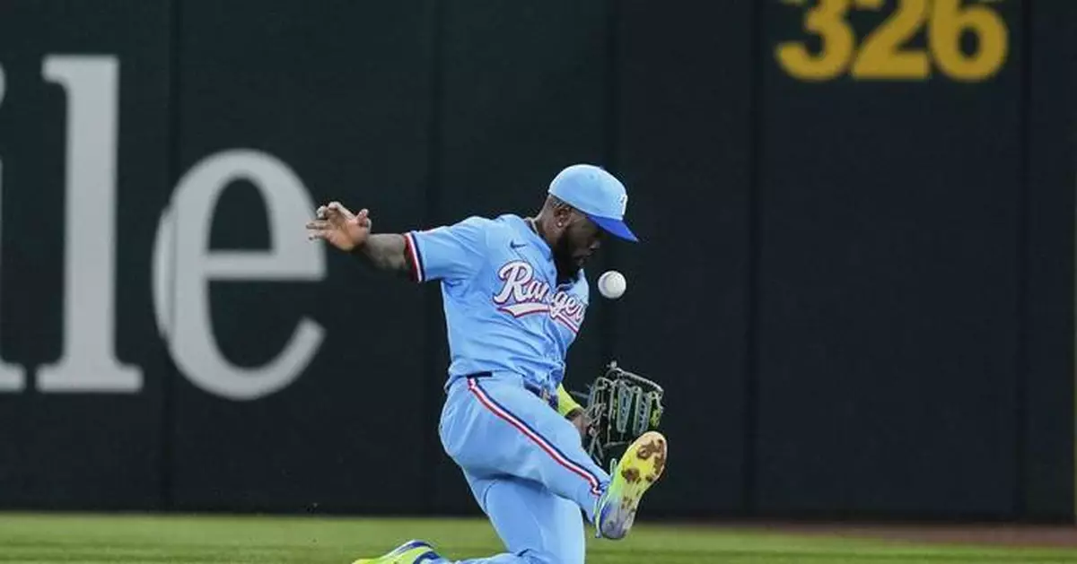 Rangers put struggling slugger Adolis García on IL and activate Evan Carter