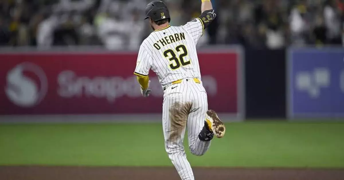 Sheets hits 2 of San Diego's 4 homers, Tatis robs Devers as the Padres beat the Giants 8-1