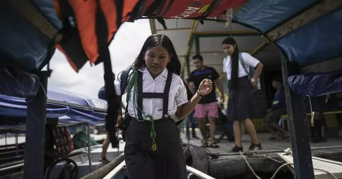 Daily life on a remote Amazon island goes on despite diplomatic dispute