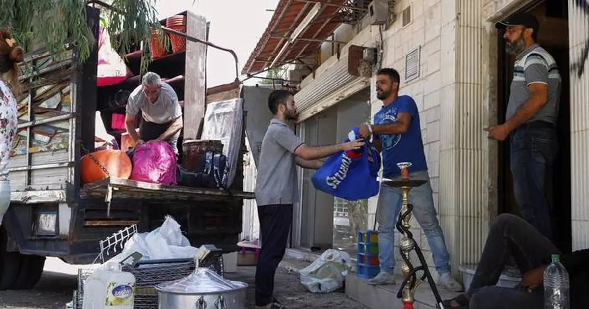 Alawite families flee Damascus suburb after violence and eviction threats