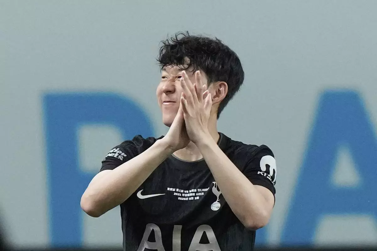 Tottenham Hotspur's Son Heung-min reacts after the pre-season friendly match against Newcastle United at Seoul World Cup Stadium in Seoul, South Korea, Sunday, Aug. 3, 2025. (AP Photo/Ahn Young-joon)