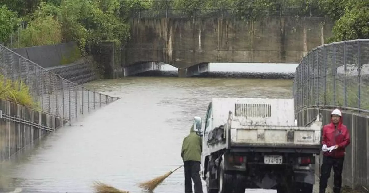 Torrential rains in southern Japan cause flooding, mudslides and travel disruptions