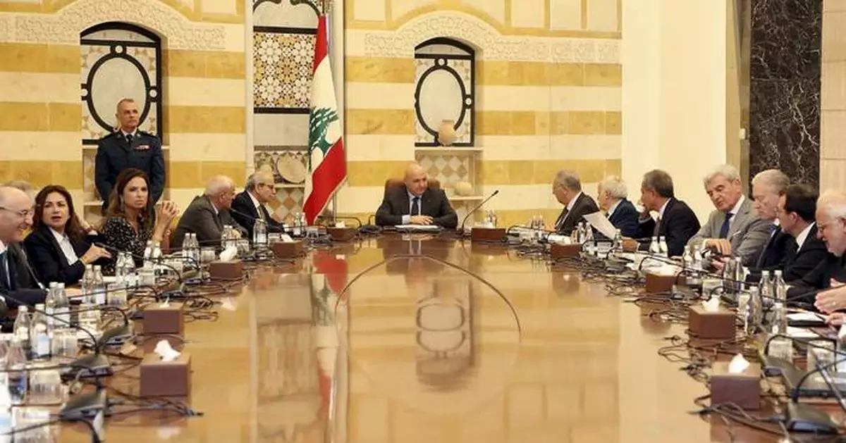 Lebanese Shiite ministers walk out of a Cabinet meeting over plan to disarm Hezbollah