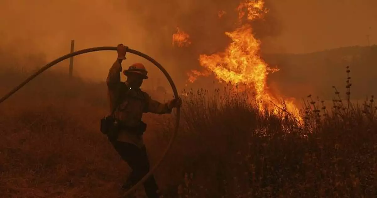 Firefighters make progress against blaze that forced thousands to flee north of Los Angeles