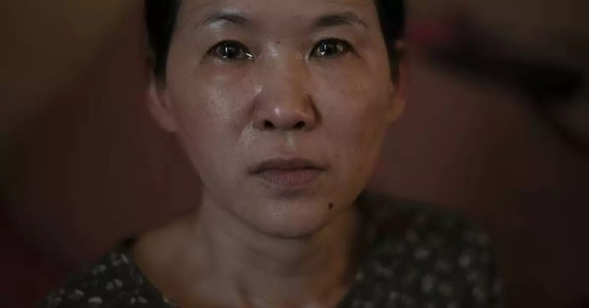 Woman seeks compensation from South Korea over her forced adoption to France in 1984
