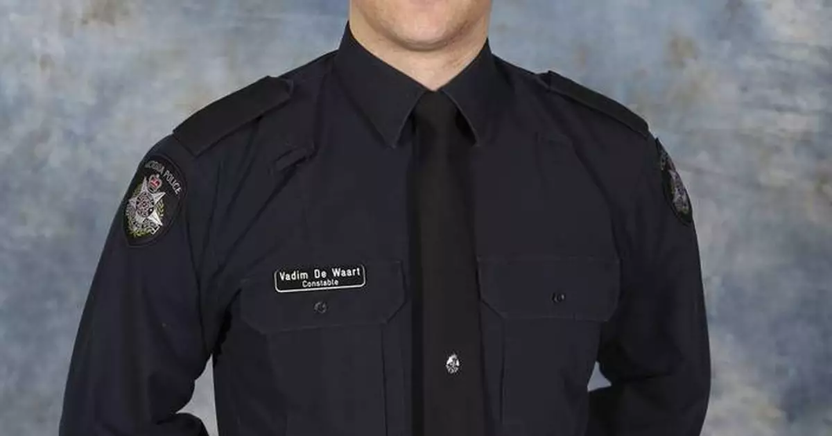 Australian police identify suspect in fatal shooting of officers as search enters second day