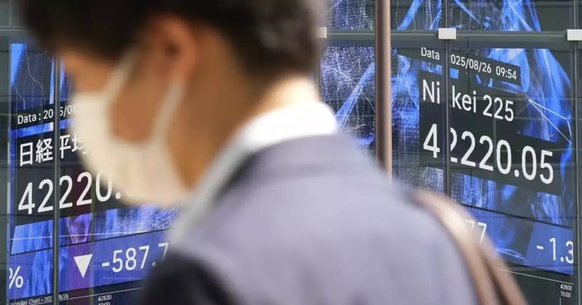 A late push sends Wall Street near its records