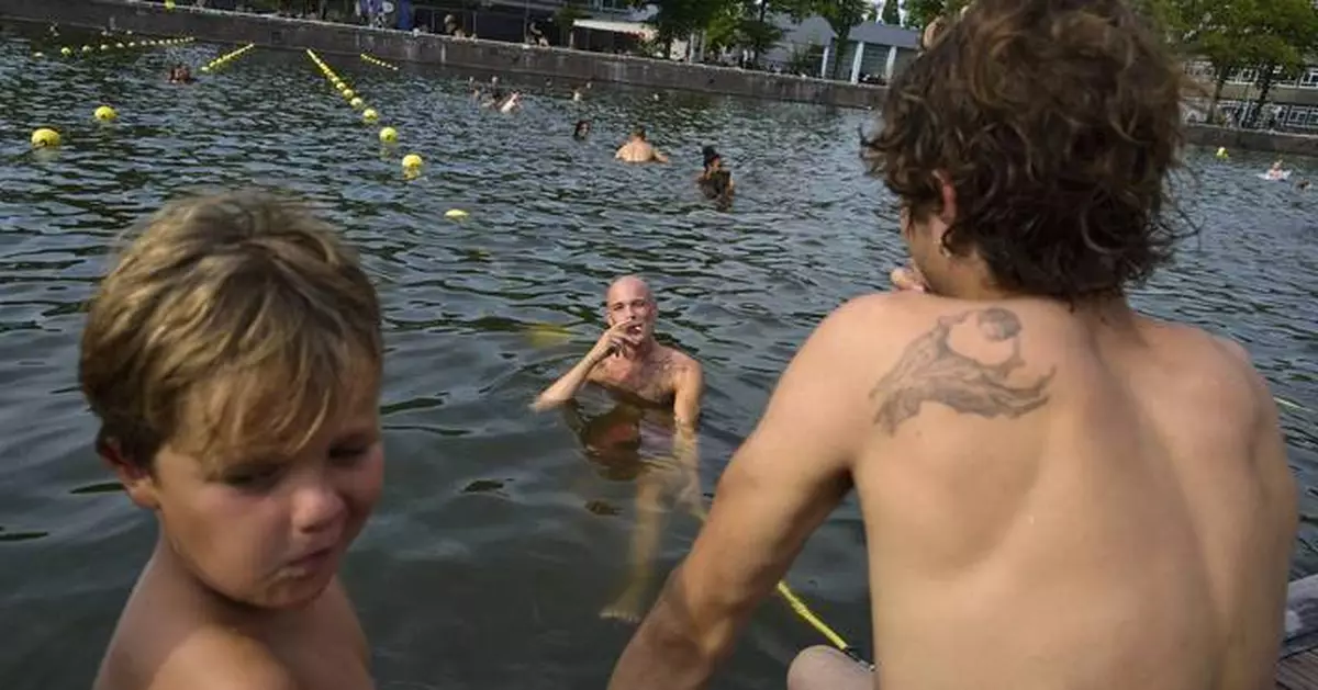 Surrounded by water, Dutch swimmers have plenty of places to cool off