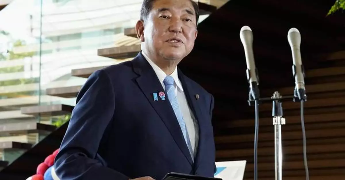 Heavy rain slams southern Japan, triggering floods and mudslides