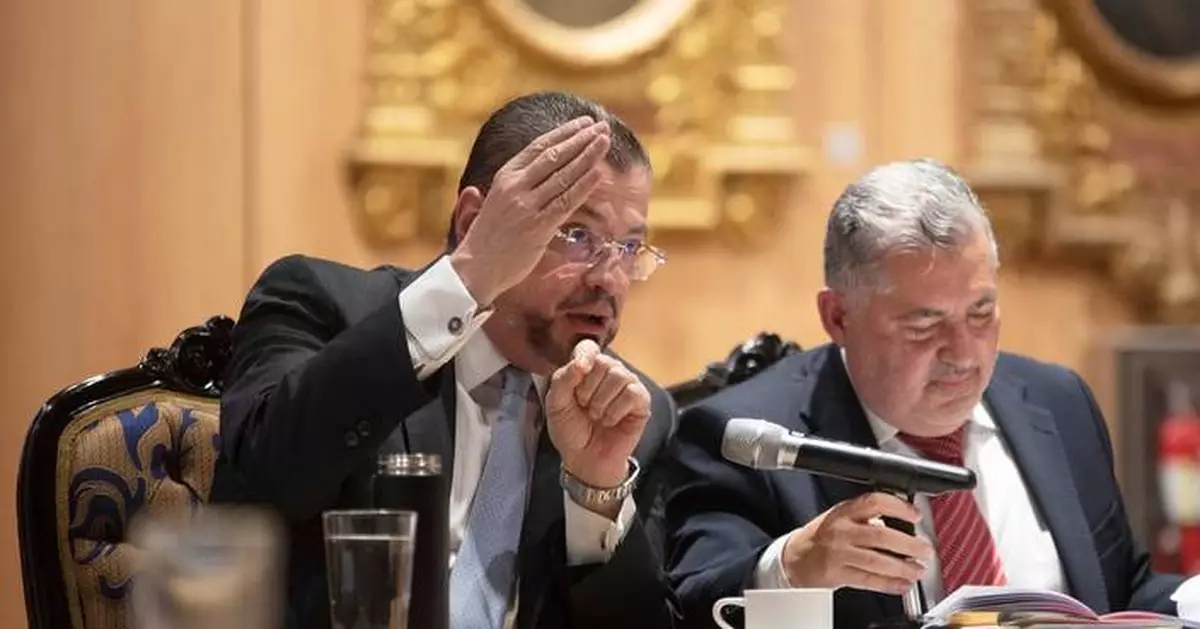 Costa Rican president appears before lawmakers and denies corruption allegations