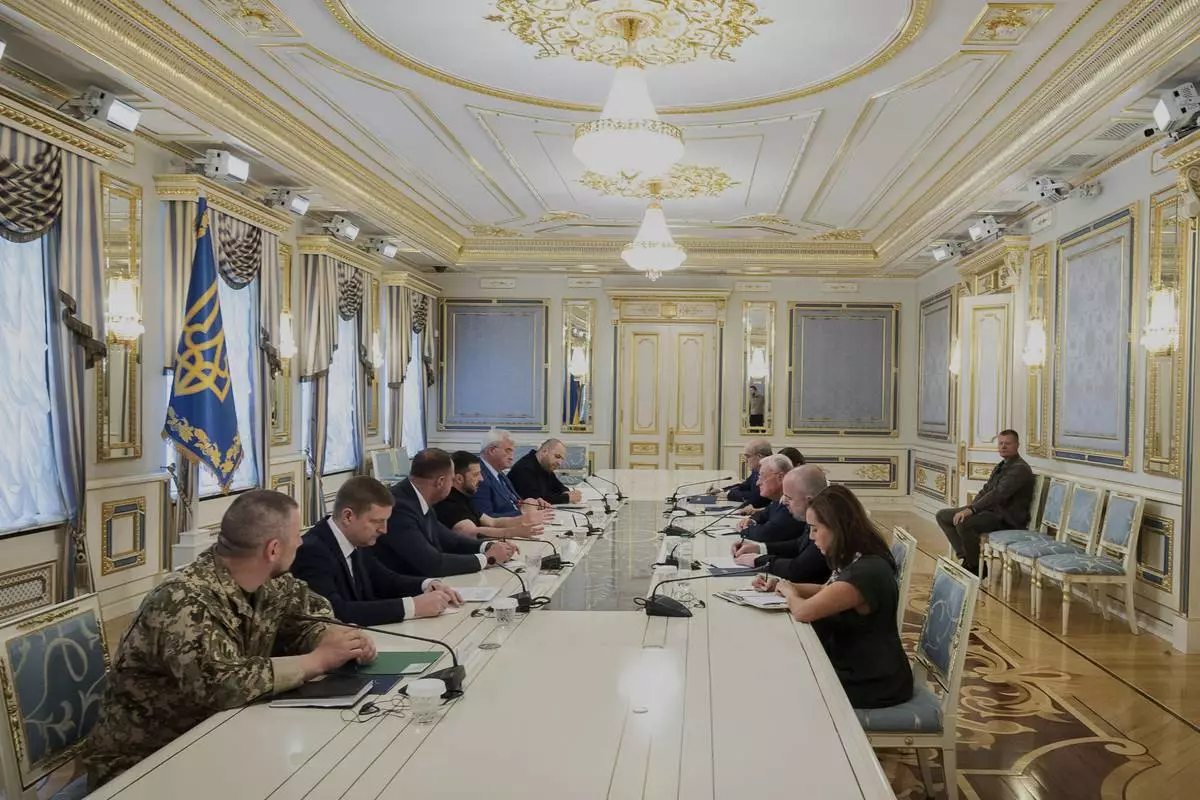 FILE - In this photo provided by the Ukrainian Presidential Press Office, Ukrainian President Volodymyr Zelenskyy, fourth from left, and United States Special Envoy for Ukraine and Russia Joseph Keith Kellogg, center right, speak during a meeting, in Kyiv, Ukraine, July 14, 2025. (Ukrainian Presidential Press Office via AP, File)