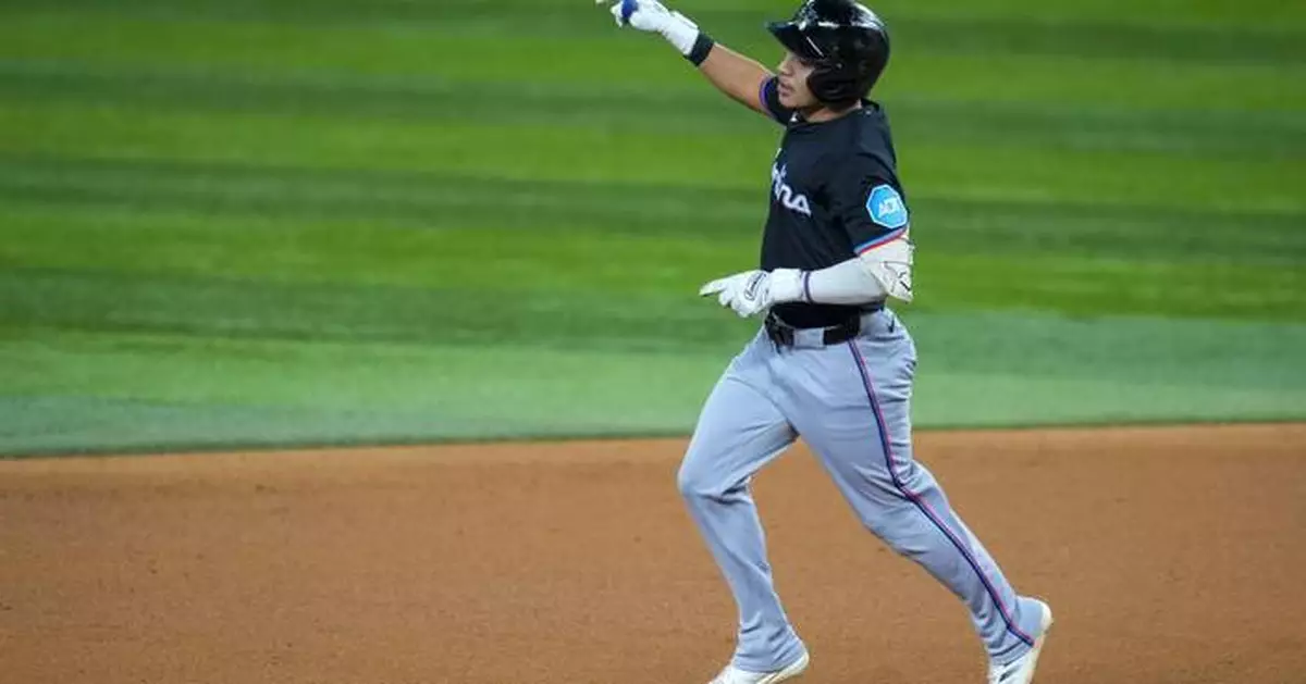 Marlins beat slumping Rangers 6-4 in 12 innings for fourth straight win