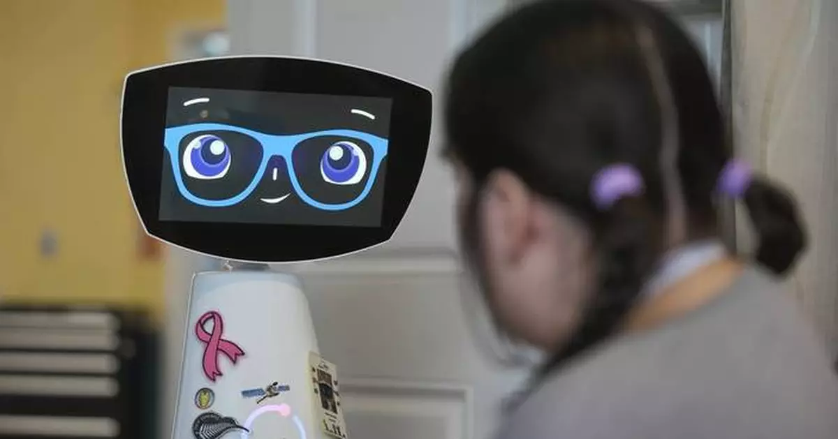 A robot programmed to act like a 7-year-old girl works to combat fear and loneliness in hospitals